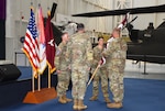 FORT RUCKER, Ala. — U.S. Army Brig. Gen. Jamie Burk, commanding general of Medical Readiness Command, East, receives the guidon from outgoing commander Lt. Col. Leah Steder during the Lyster Army Health Clinic change of command ceremony at the Army Aviation Museum on Fort Rucker, Alabama, July 9, 2026. During the ceremony, Lt. Col. Ryan Allred assumed command of the clinic.
