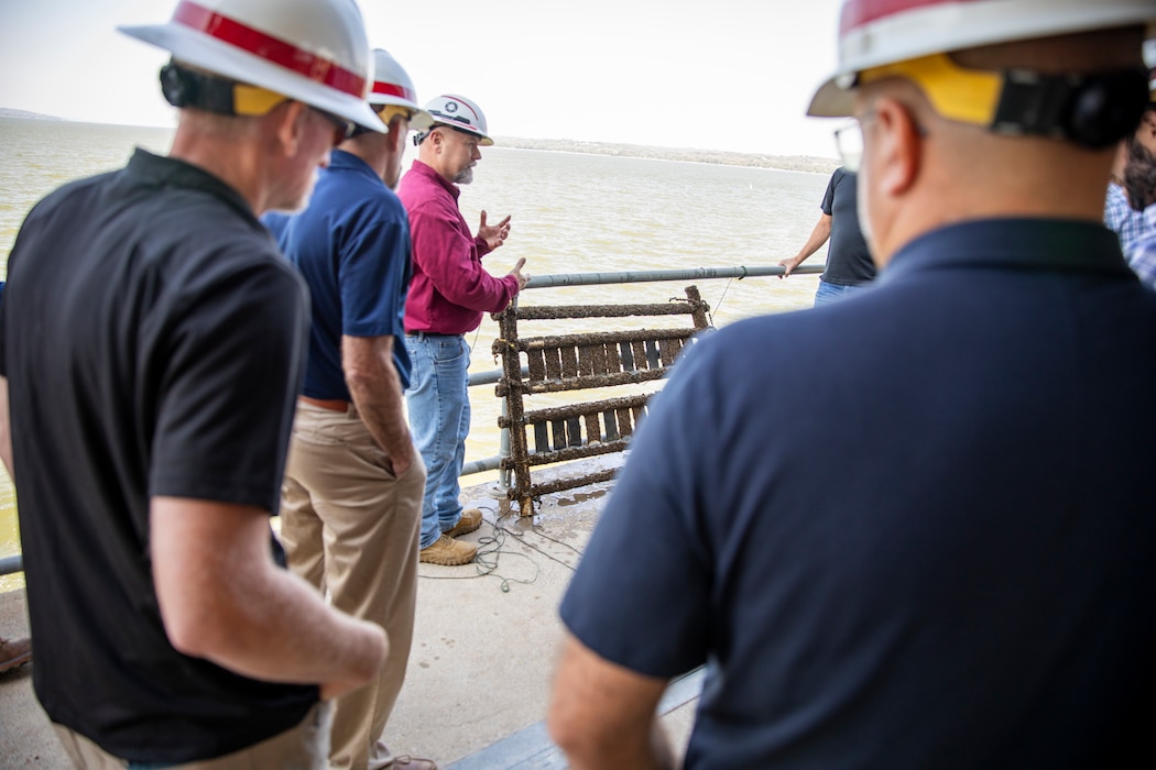 Eric Johnson, Gavins Point Dam assistant power plant superintendent and maintenance and operations manager, U.S. Army Corps of Engineers, Omaha District, shares information about invasive zebra mussels to a team of Walla Walla District operations during their visit to Gavins Point in Yankton, South Dakota, Aug. 26, 2026.