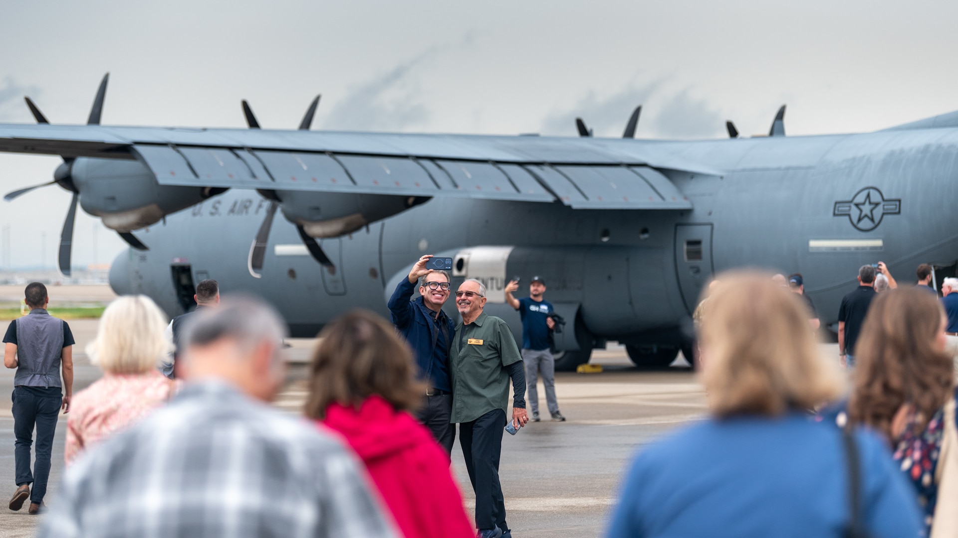 A group of civilian employers takes a selfie before boarding a 123rd Airlift Wing C-130J Super Hercules during an Employer Support of the Guard and Reserve Bosslift at the Kentucky Air National Guard Base in Louisville, Ky., Sept. 10, 2026. The event gave employers an opportunity to tour the base and fly to the National Museum of the United States Air Force in Dayton, Ohio, providing them with a better understanding of the Air National Guard mission and the role their employees play in it as part-time Airmen in the Kentucky Guard and reservists of the United States Air Force. (U.S. Air National Guard photo by Phil Speck)