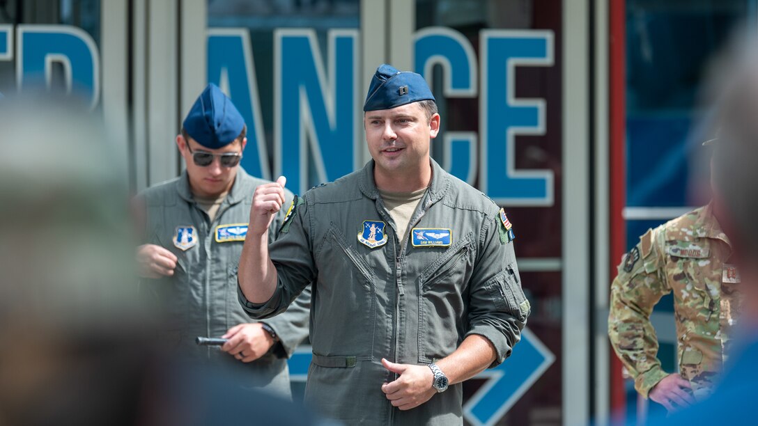 U.S Air Force Capt. Sam Williams, a C-130J Super Hercules pilot with the Kentucky Air National Guard’s 165th Airlift Squadron, talks to a group of civilian employers in front of the National Museum of the United States Air Force in Dayton, Ohio, during an Employer Support of the Guard and Reserve Bosslift on Sept. 10, 2026. The event gave employers an opportunity to tour the Kentucky Air National Guard Base in Louisville, Ky., and fly to the museum, providing them with a better understanding of the Air National Guard mission and the role their employees play in it as part-time Airmen in the Kentucky Guard and reservists of the United States Air Force. (U.S. Air National Guard photo by Phil Speck)