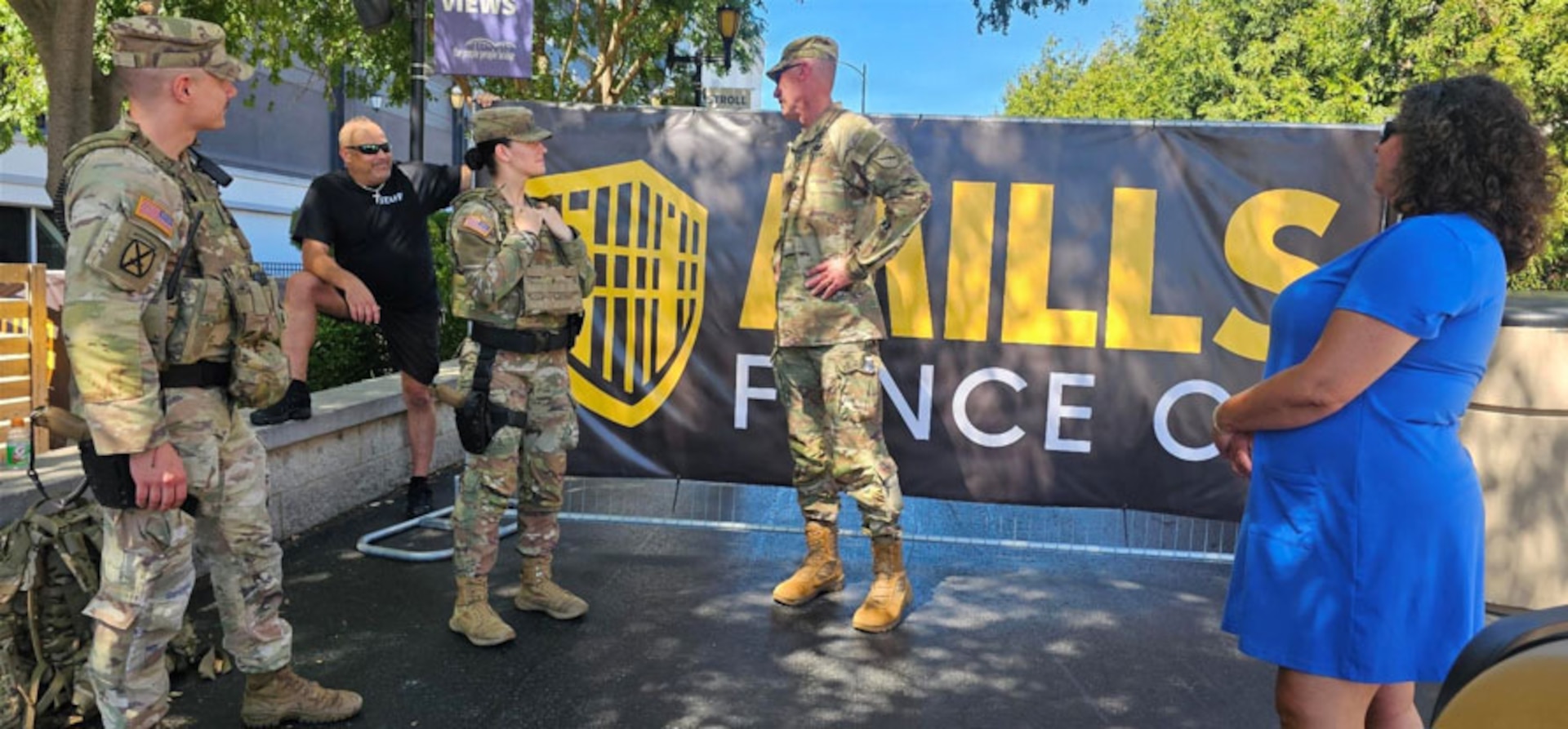 U.S. Army Brig. Gen. Brian Wertzler, Kentucky’s deputy adjutant general, talks with Soldiers of the 617th Military Police Company, 198th Military Police Battalion while working with the Newport Police Department for Riverfest 2026 in Newport, Kentucky, Sept. 6, 2026.