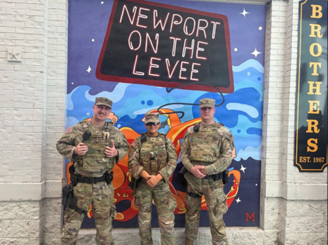 Kentucky National Guard Soldiers with the 617th Military Police Company, 198th Military Police Battalion pose for a photo during their recent mission working with the Newport Police Department during Riverfest 2026 in Newport, Kentucky, Sept. 6, 2026.