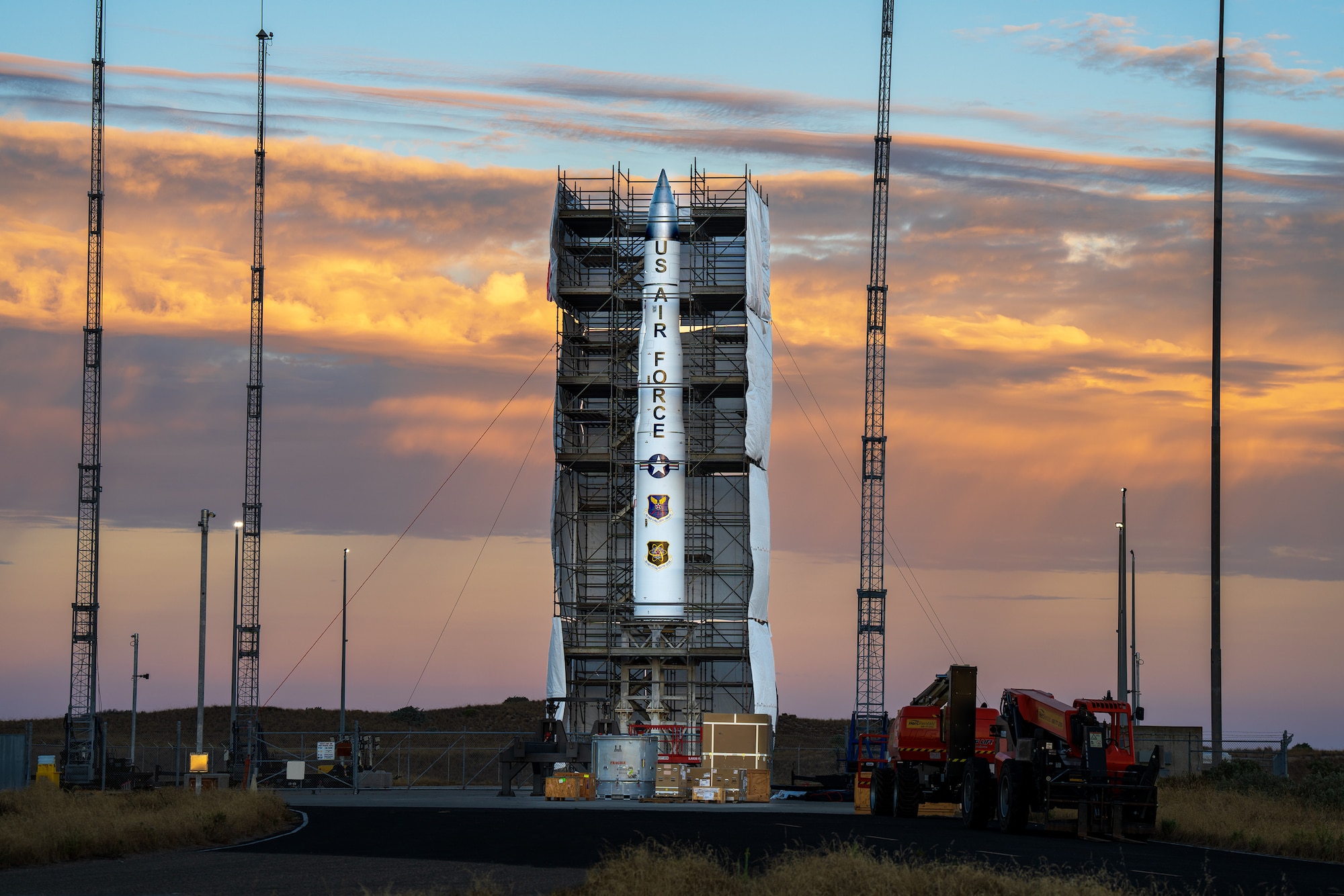 An inert missile body is shown surrounded by scaffolding