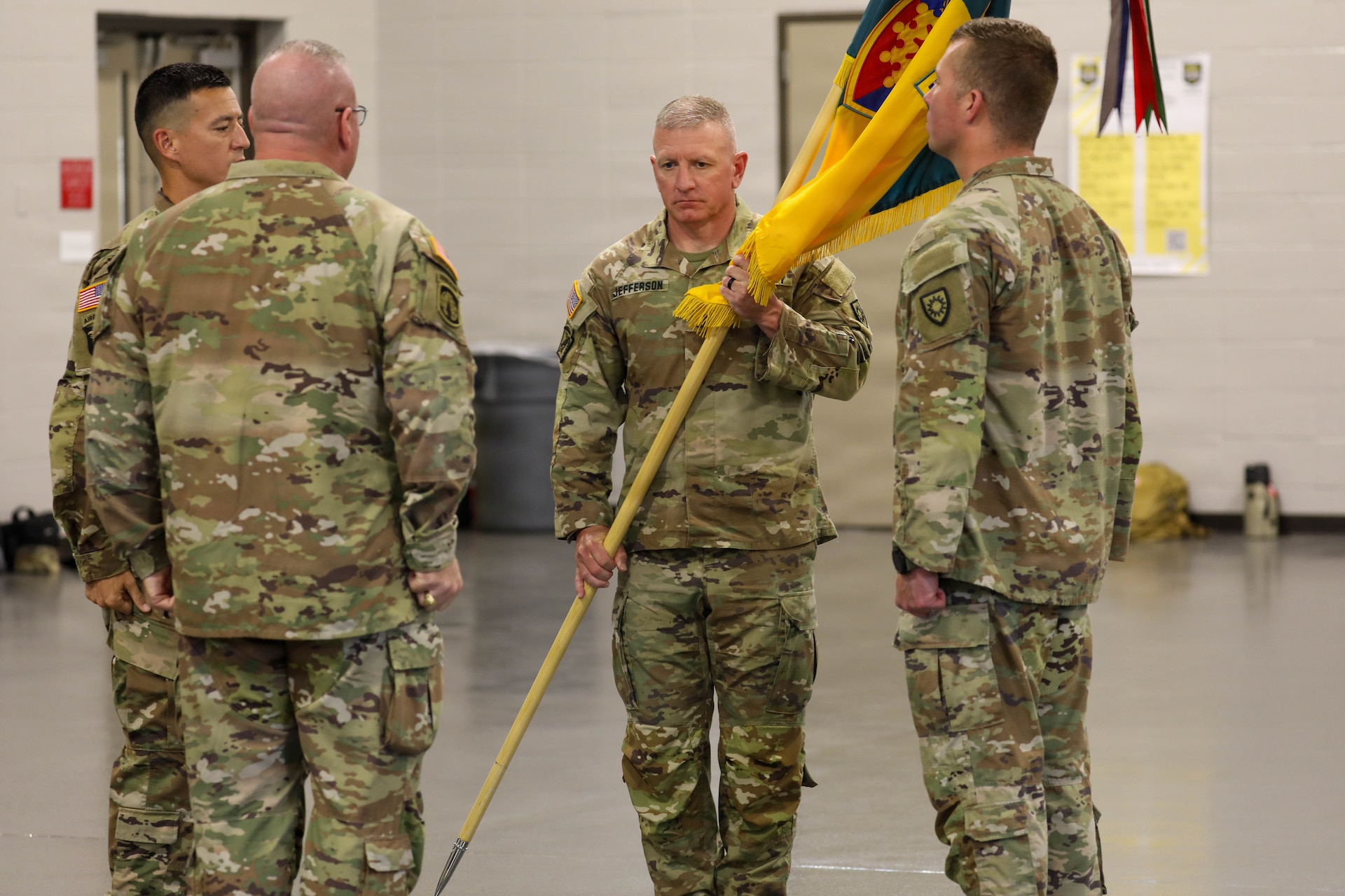 U.S. Army Command Sgt. Maj. Bryan M. Jefferson, incoming command sergeant major of Kentucky's 149th Maneuver Enhancement Brigade, receives the guidon from the brigade commander, Col. Terry Durham, during a change of responsibility ceremony at the Richmond National Guard Armory, Sept. 11, 2026.