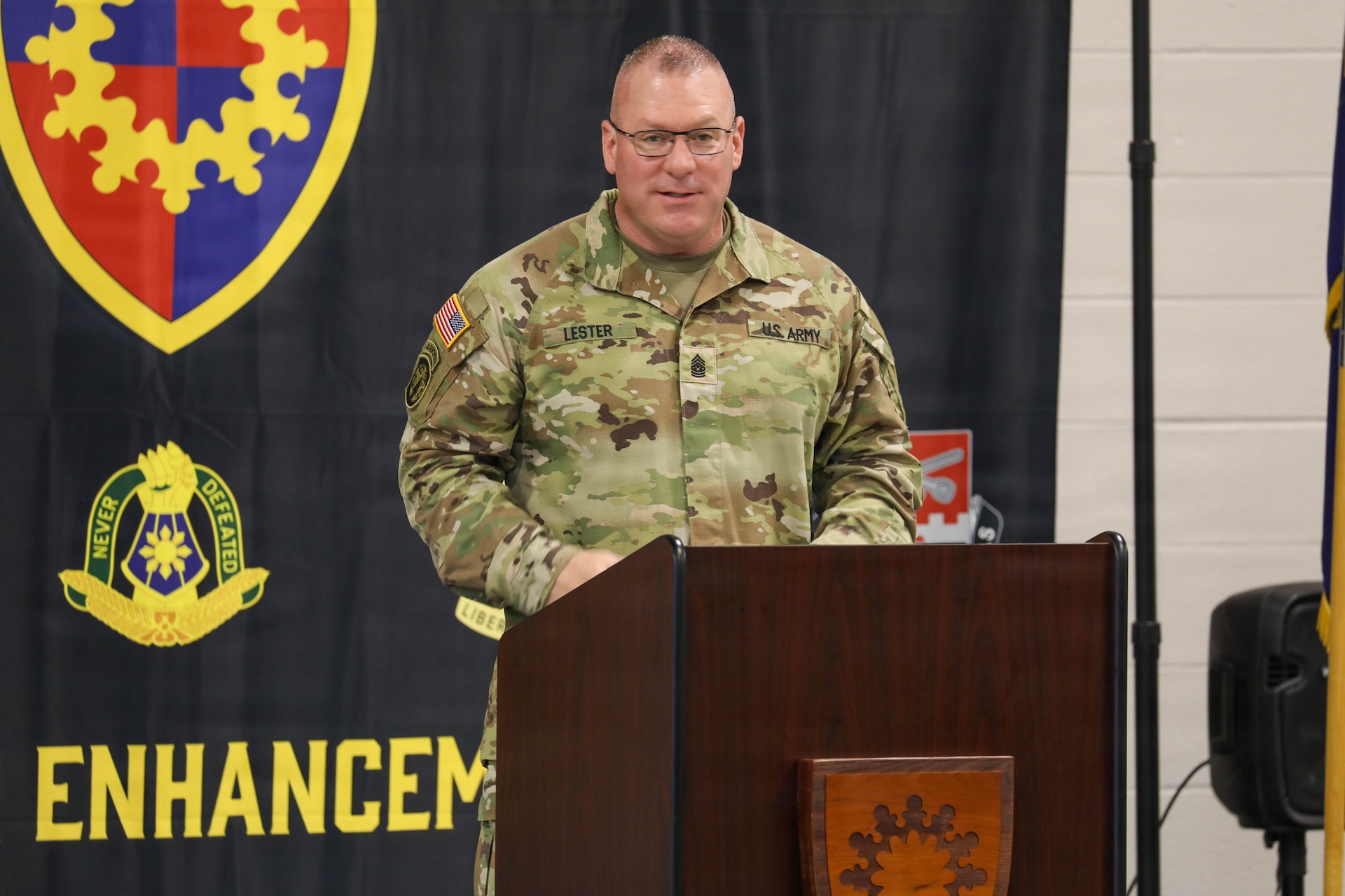 U.S. Army Command Sgt. Maj. Aaron T. Lester delivers remarks after relinquishing responsibility of Kentucky's 149th Maneuver Enhancement Brigade to Command Sgt. Maj. Bryan M. Jefferson during a ceremony at the Richmond National Guard Armory, Sept. 11, 2026.
