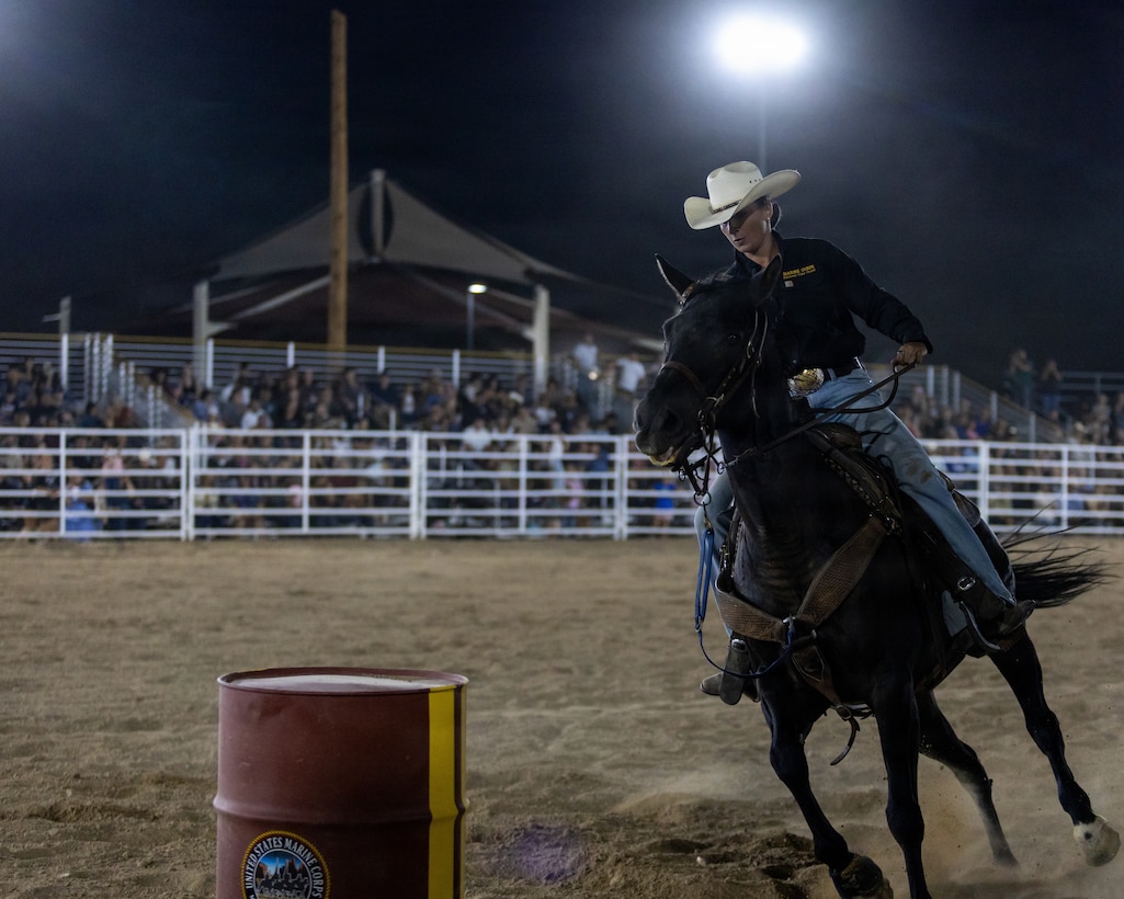 U.S. Marine Corps Sgt. Lauren Lynch, a stable keeper with the Mounted Color Guard, competes in barrel racing during the Barstow Western Roundup at Marine Corps Logistics Base Barstow, Calif., Sept. 12, 2026. The event marked the first rodeo hosted by the Marine Corps Mounted Color Guard Association and held special significance for the Marine Corps’ last remaining mounted color guard and MCLB Barstow, whose participation continues a unique tradition of horsemanship, ceremonial excellence and community engagement. (U.S. Marine Corps photo by Lance Cpl. Jonathan Sherchand)
