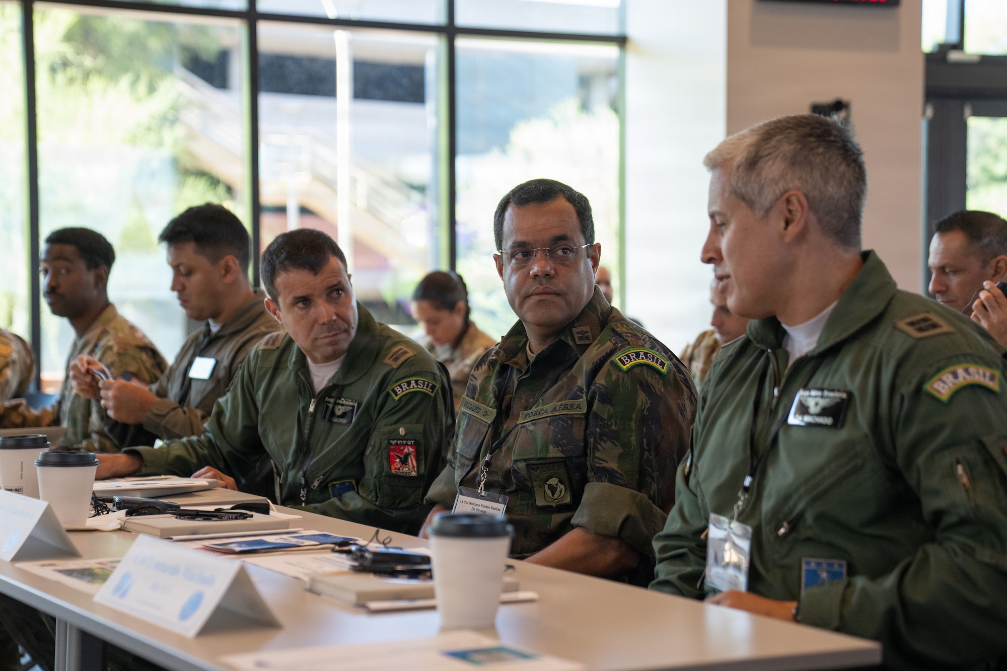 Brazilian air force members discuss applications of space operations during the 2026 Space Doctrine Conference in Tucson, Arizona, Sept. 1, 2026. The conference brought together U.S. and partner-nation representatives to advance space doctrine, develop regional Centers of Excellence and identify opportunities for future multinational cooperation