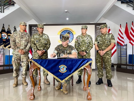 U.S. Marine Corps Lt. Gen. George Rowell, U.S. Pacific Command Deputy Commander, stands with fellow service members at the Douglas Munro Memorial at Point Cruz, Solomon Islands, Sept. 5, 2026.