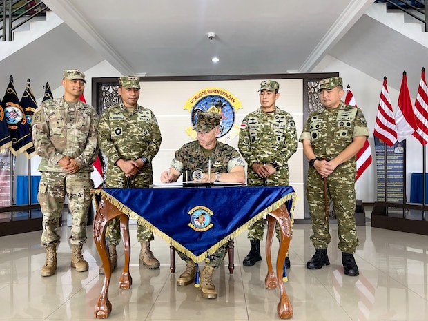 U.S. Marine Corps Lt. Gen. George Rowell, U.S. Pacific Command Deputy Commander, stands with fellow service members at the Douglas Munro Memorial at Point Cruz, Solomon Islands, Sept. 5, 2026.