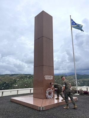 U.S. Marine Corps Lt. Gen. George Rowell, U.S. Pacific Command Deputy Commander, stands with fellow service members at the Douglas Munro Memorial at Point Cruz, Solomon Islands, Sept. 5, 2026.
