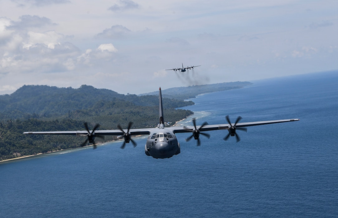 A U.S. Air Force C-130J Super Hercules aircraft, front, and an Indonesian Air Force C-130H Hercules aircraft fly on a training sortie during Exercise Cope West 26 over Indonesia, Sept. 10, 2026.