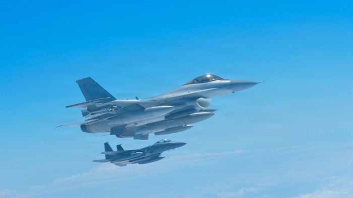 Two Japan Self-Defense Force F-15J Eagles fly in formation in international airspace in the western pacific in support of Freedom Edge 26, Sep. 11, 2026.