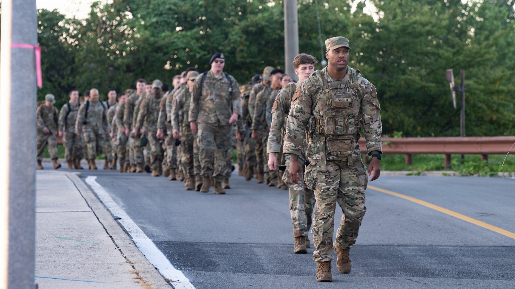 U.S. service members participate in a ruck march at Osan Air Base, Republic of Korea, Sept. 11, 2026. The ruck honors firefighter Stephen Siller, who strapped on 60 pounds of gear and ran through the Brooklyn-Battery Tunnel to reach the World Trade Center, where he lost his life while attempting to save others. (U.S. Air Force photo by Senior Airman Jessica Mun)