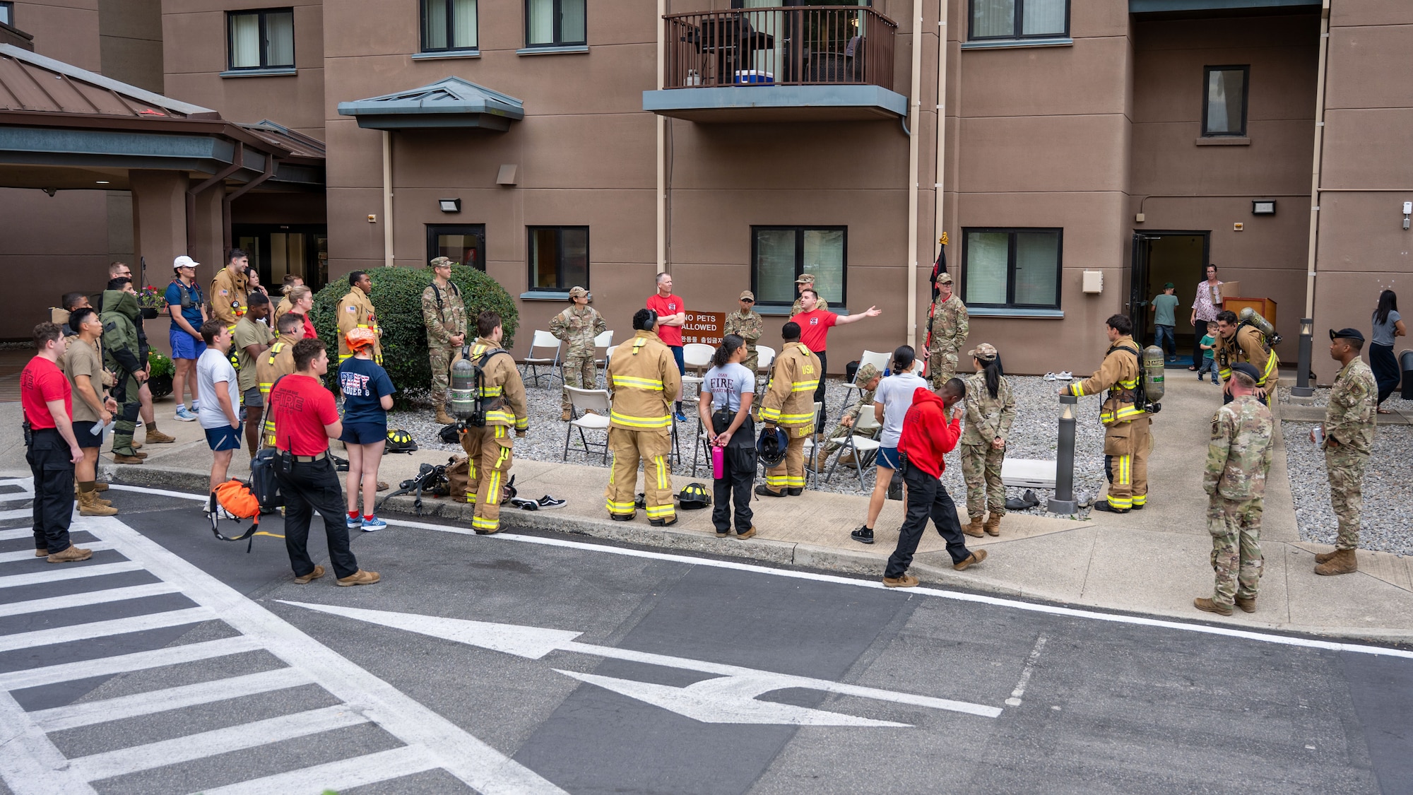 Participants gather before a 9/11 memorial stair climb at Osan Air Base, Republic of Korea, Sept. 11, 2026. The observance brought the Osan community together to reflect on the sacrifice, courage and unity demonstrated in response to the attacks. (U.S. Air Force photo by Senior Airman Rome Bowermaster)