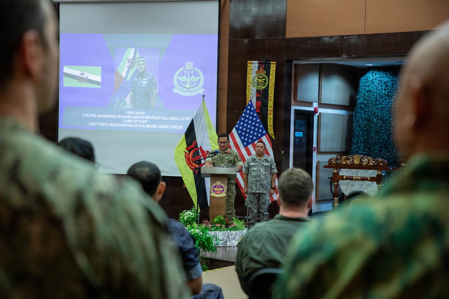 Col. Muhammad Suwardi Ariffin, left, chief of staff of Joint Force Headquarters, Royal Brunei Armed Forces, delivers opening remarks during the opening ceremony for exercise Cooperation Afloat Readiness and Training (CARAT) Brunei 2026, Sept. 14, 2026. CARAT Brunei 2026 is a bilateral exercise designed to enhance U.S. and partner navies’ abilities to operate together in response to shared maritime security challenges in the Indo-Pacific region. (U.S. Navy photo by Mass Communication Specialist 1st Class Dakota L. David)
