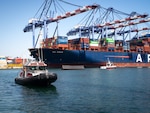 A Los Angeles Fire Department 40-foot small boat crew pushes a container to the pier at the Los Angeles Harbor, Sept. 14, 2026.