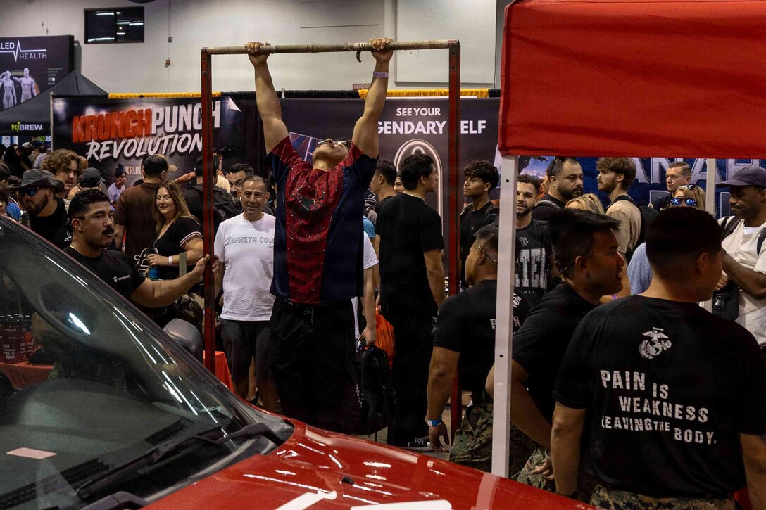 U.S. Marines with Recruiting Station Orange County connect with attendees during the Anaheim Fitness Expo at the Anaheim Convention Center in Anaheim, California, Aug. 30, 2026. The Anaheim Fitness Expo brings together a diverse range of fitness brands, competitions, and demonstrations to inspire and guide individuals on their fitness journeys. (U.S. Marine Corps photo by Lance Cpl. Adrian Guerrero Martinez)