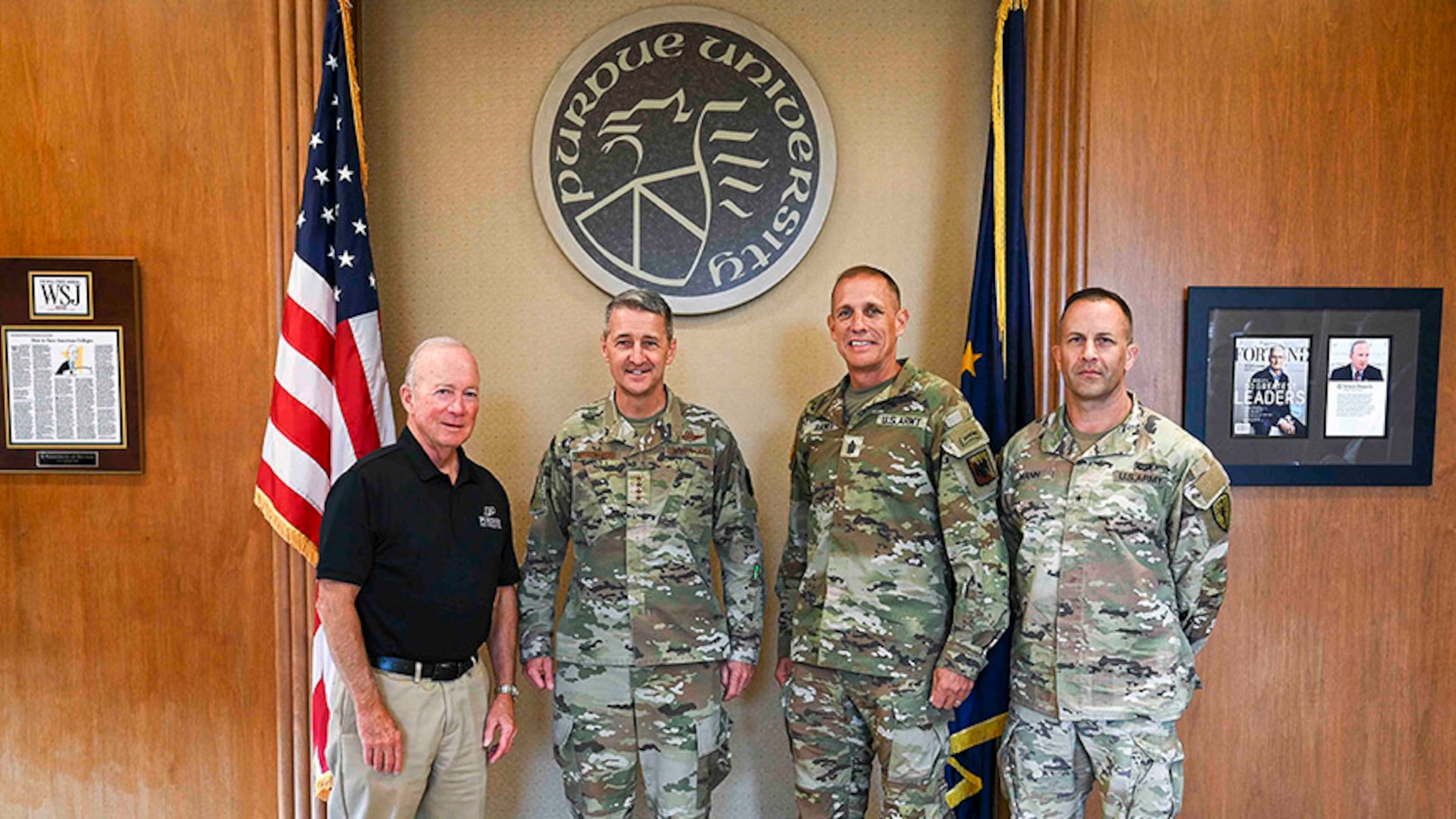 From left: Interim President Mitch Daniels met with Gen. Steven Nordhaus, chief of the National Guard Bureau; John Raines III, senior enlisted advisor to the chief of the National Guard Bureau; and Brig. Gen. Justin Mann, director of the Joint Staff for the Indiana National Guard, to discuss military and national security programming at Purdue.
