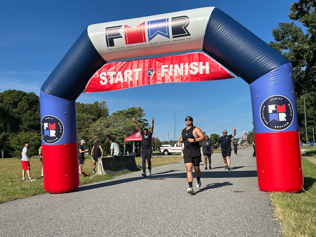 Runners cross start/finish line
