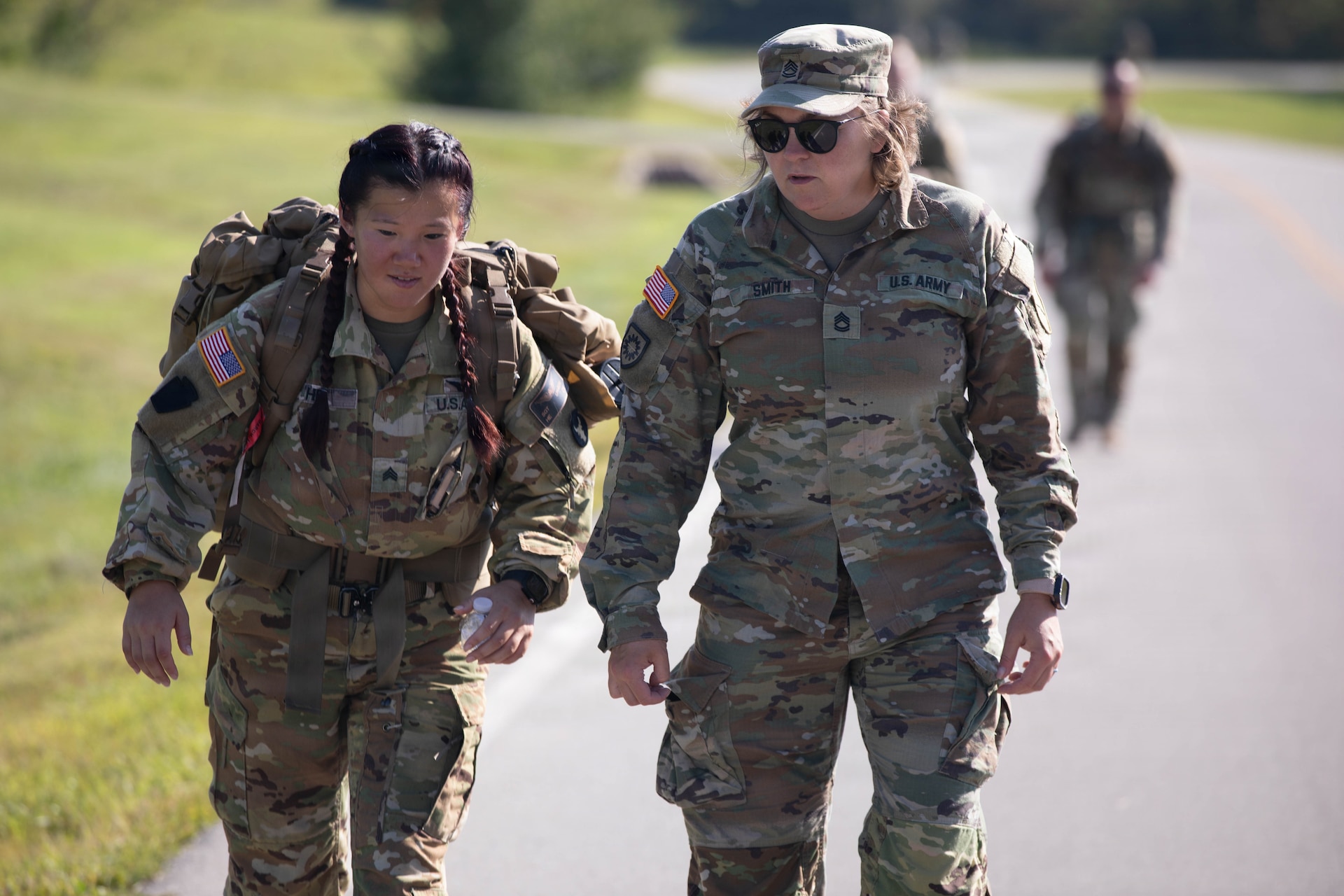 U.S. Army Sgt. 1st Class Patricia Smith talks with Sgt. Tyler He during the inaugural Danish Flyver Ruck March at Boone National Guard Center in Frankfort, August 28.