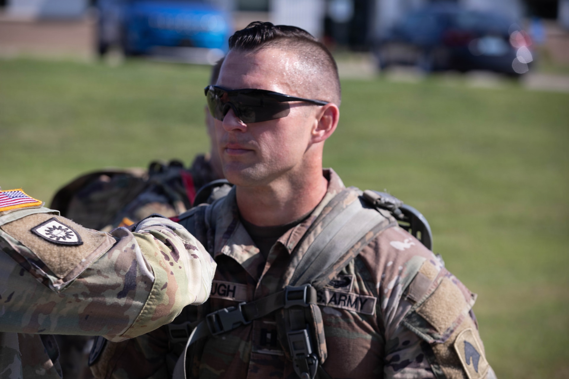 U.S. Army Capt. Jay Brough being marked as he completes his final lap in the inaugural Danish Flyver Ruck March at Boone National Guard Center in Frankfort, August 28.