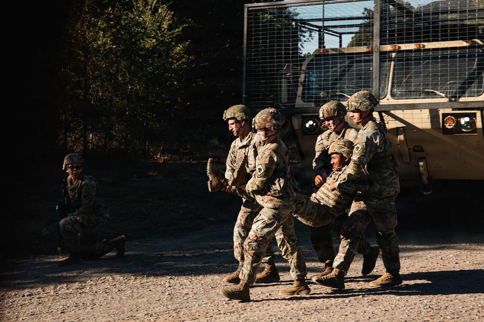 Oklahoma National Guard Soldiers with the 345th Combat Sustainment Support Battalion, 90th Troop Command, move a simulated casualty during medical evacuation training at Exercise Thunderstruck 3.0 at Camp Gruber Training Center near Braggs, Oklahoma, Sept. 12, 2026.