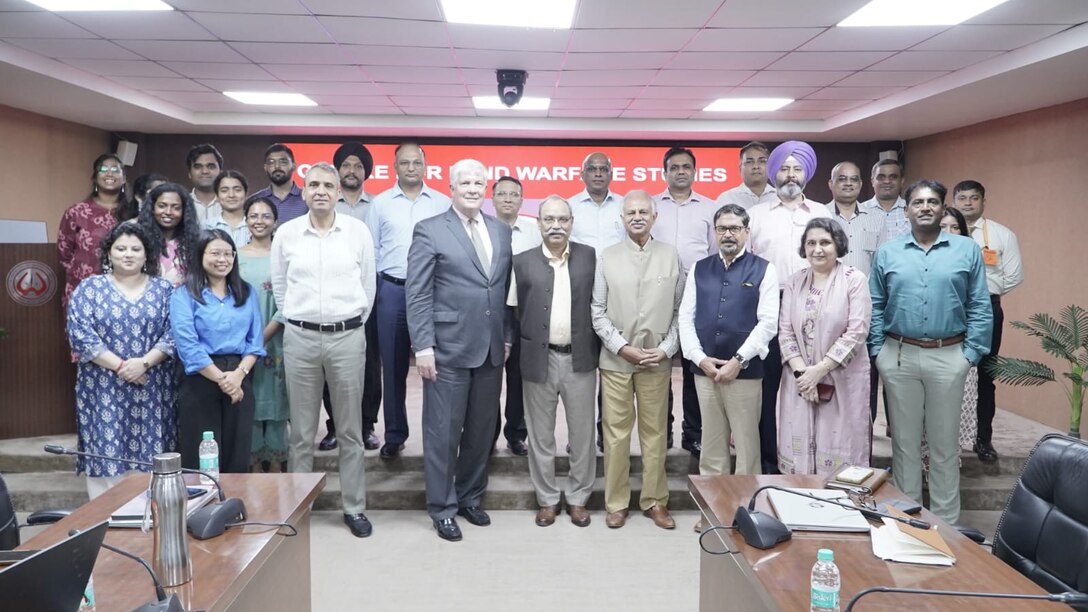 Dr. Tom Lynch of INSS stands next to military strategy and intelligence leaders during a visit to New Delhi, India.