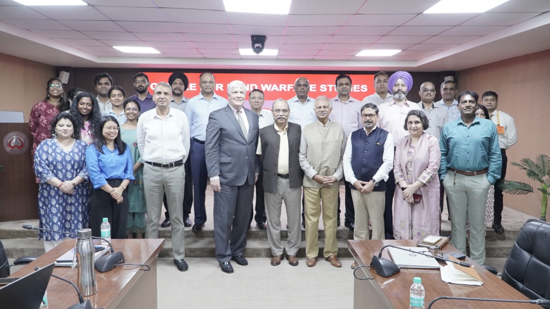 Dr. Tom Lynch of INSS stands next to military strategy and intelligence leaders during a visit to New Delhi, India.