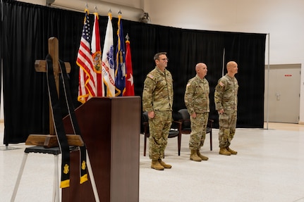 Brig. Gen. Adam Curry, director of the joint staff for the Florida National Guard, left; Col. Glenn Finch, outgoing state command chaplain, center; and Lt. Col. Lance Sellon, incoming state command chaplain, conduct a changing of the stole ceremony at the Robert F. Ensslin Jr. Armory, Florida, Sept. 12, 2026.