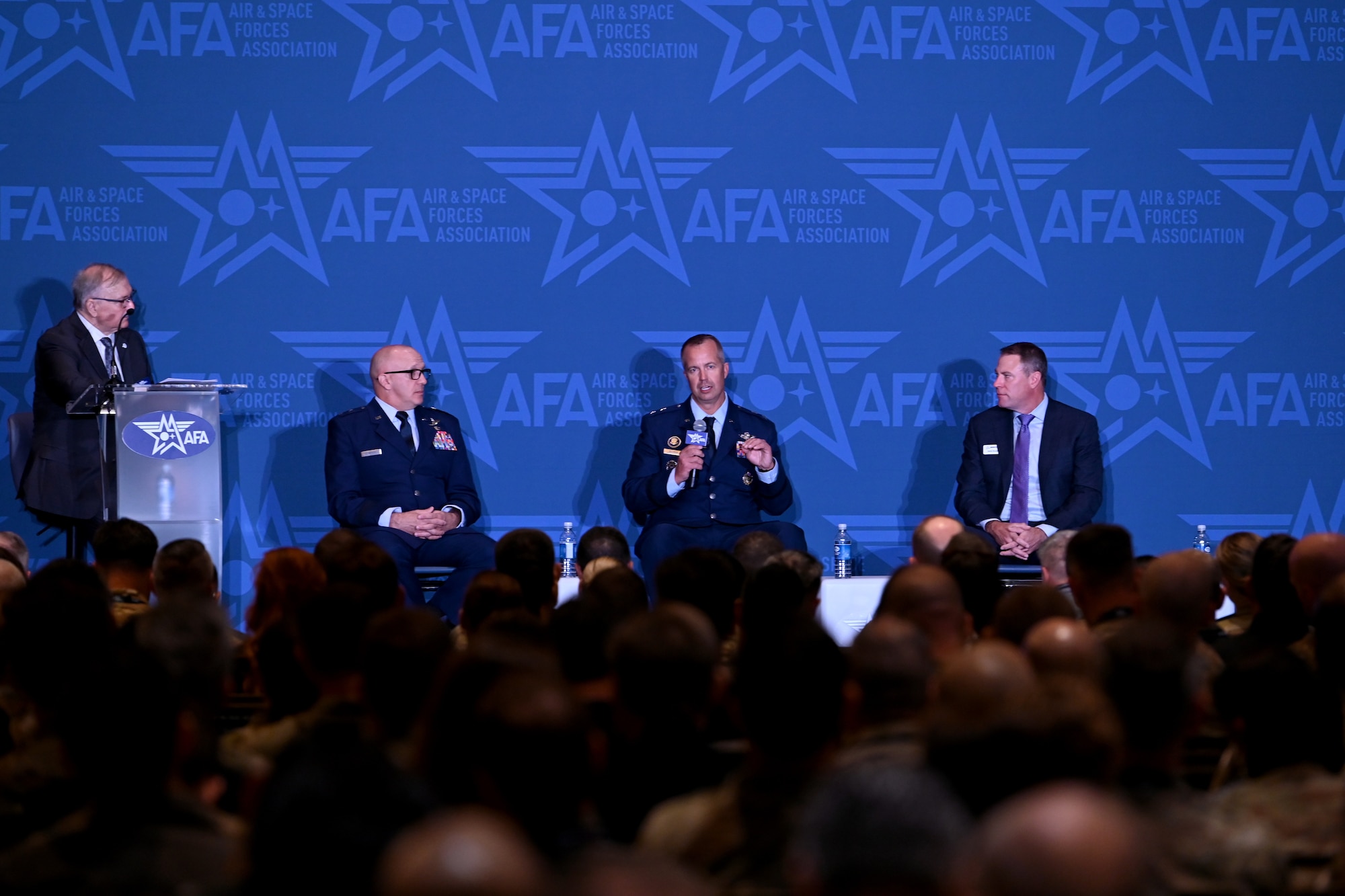 Maj. Gen. Ty Neuman (center), Eighth Air Force and Joint-Global Operations Center commander, speaks at the Long-Range Airpower: Lessons From Midnight Hammer and Epic Fury panel