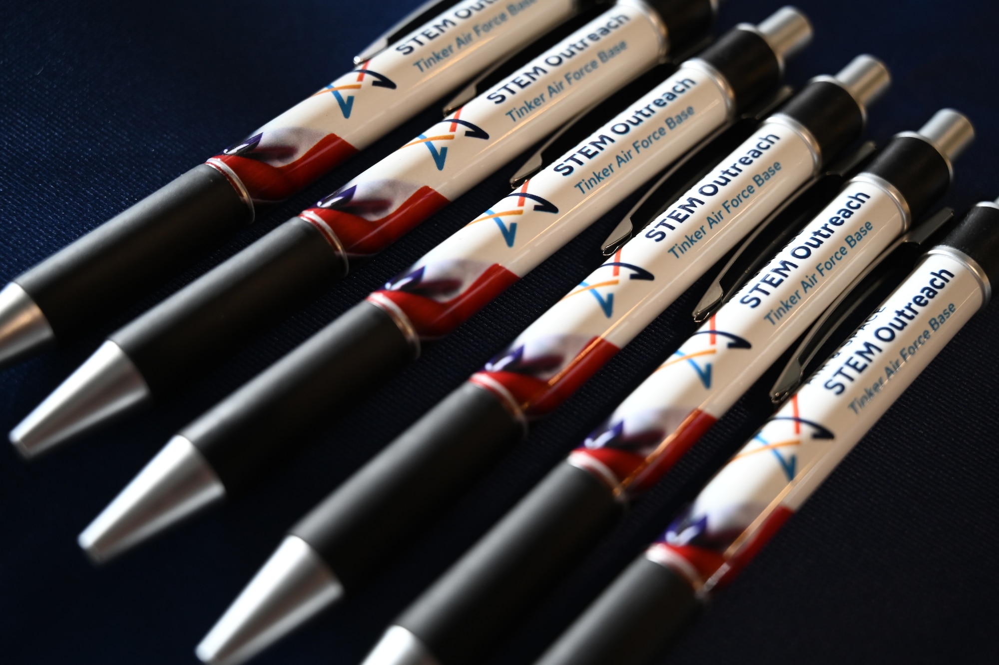 Pens on a table.