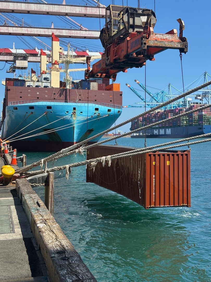 A shipping container is lifted from the water near Berth 302 at the Port of Los Angeles, Sept. 15, 2026.