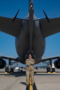 U.S. Air Force Master Sgt. Javier Garcia, 2nd Air Refueling Squadron KC-46A Pegasus aircraft boom operator instructor, poses beneath the boom of a KC-46A before a routine training flight at Joint Base McGuire-Dix-Lakehurst, N.J., July 31, 2026.