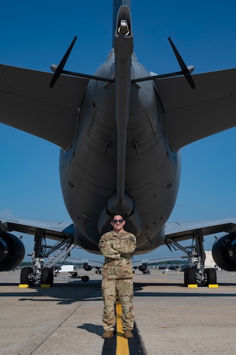 U.S. Air Force Master Sgt. Javier Garcia, 2nd Air Refueling Squadron KC-46A Pegasus aircraft boom operator instructor, poses beneath the boom of a KC-46A before a routine training flight at Joint Base McGuire-Dix-Lakehurst, N.J., July 31, 2026.