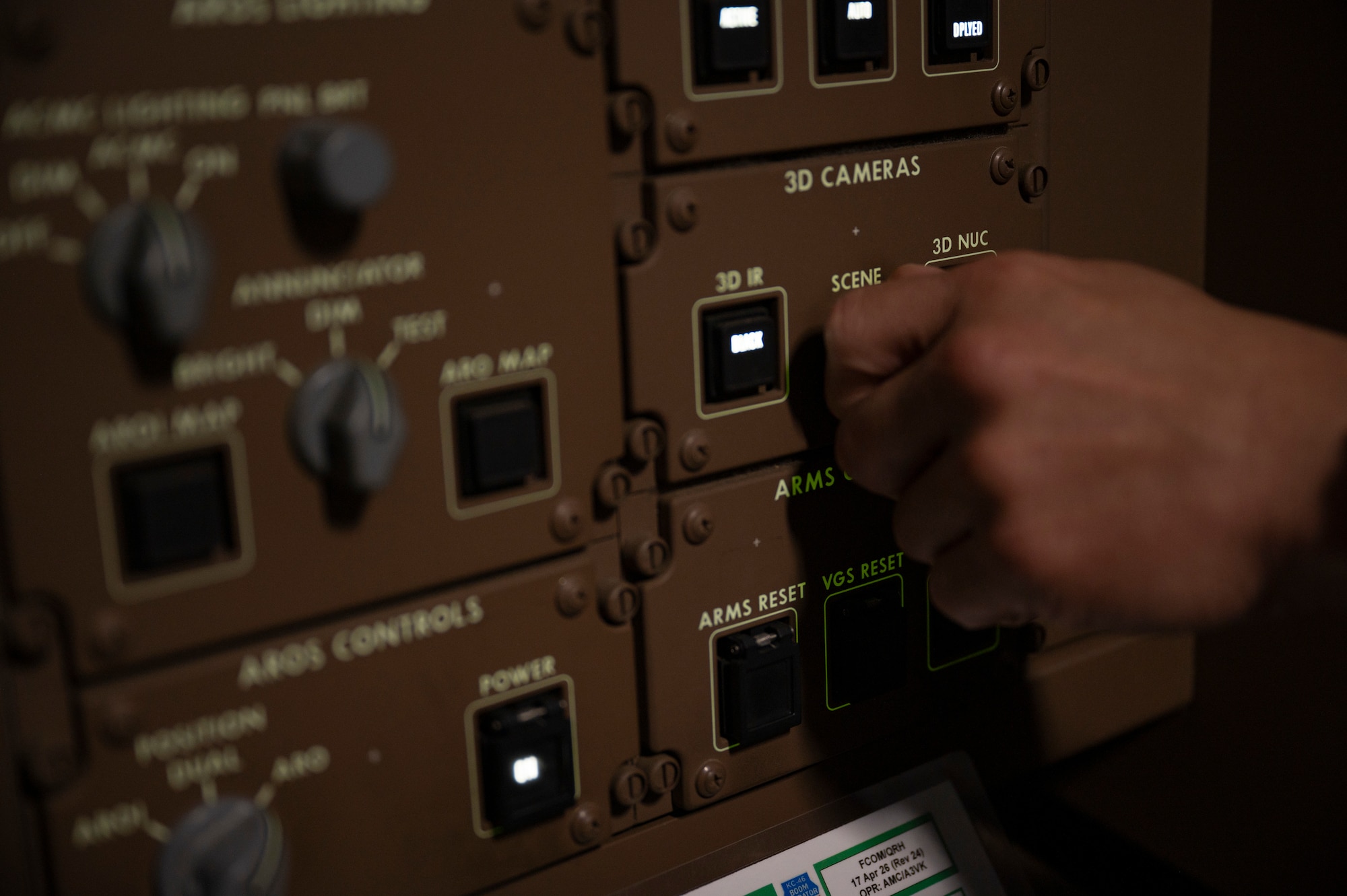 U.S. Air Force Master Sgt. Javier Garcia, 2nd Air Refueling Squadron KC-46A Pegasus aircraft boom operator instructor, adjusts settings on the remote vision system aboard a KC-46A during aerial refueling training over the Atlantic Ocean, July 31, 2026.