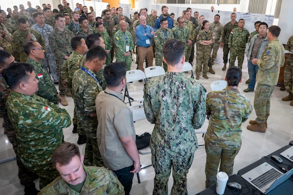 Multinational service members listen to an update  brief during a staff exercise held at the Indonesian Armed Forces Staff and Command School during Super Garuda Shield 26 in Bandung, Indonesia, Sep. 5, 2026.