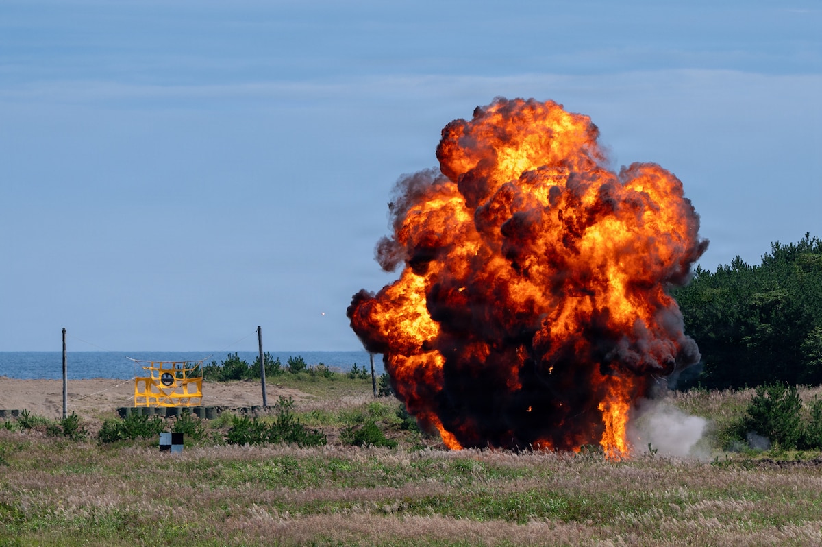 Ordnance detonates after being deployed by a U.S. Air Force F-16 Fighting Falcon during Misawa Range Day at Draughon Range near Misawa Air Base, Japan, Sept. 11, 2026. Live munitions training showcased the precision combat capabilities 35th Fighter Wing Airmen maintain to generate credible airpower, deter aggression and remain ready to respond to operational demands across the Pacific. (U.S. Air Force photo by Airman 1st Class Angelica Winther)